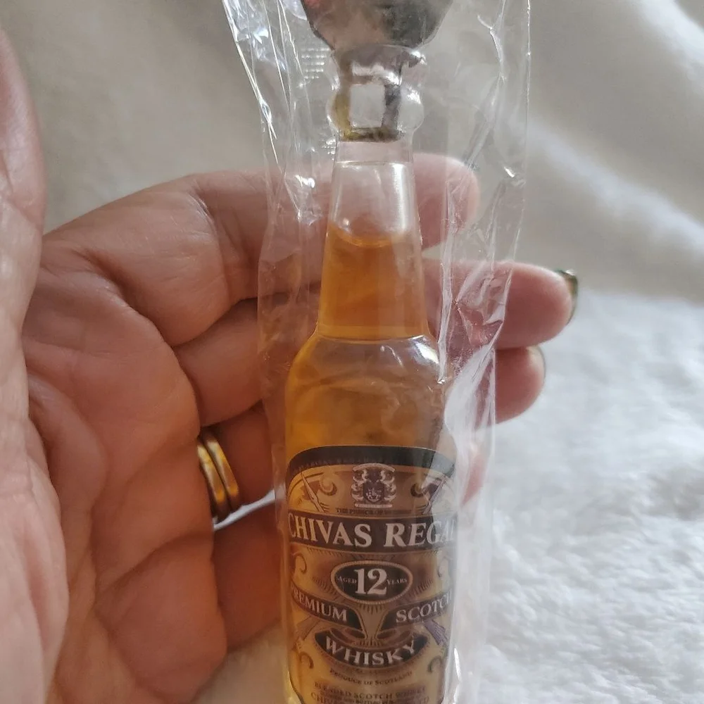 This is just a bottle opener! lol. Chivas Regal Brown Gold 5.5 inches